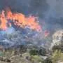 Firefighters gain upper hand on deadly Spain wildfire