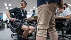 Tokyo urges men to wear shorts to work, but women say it's 'leg hair harassment'