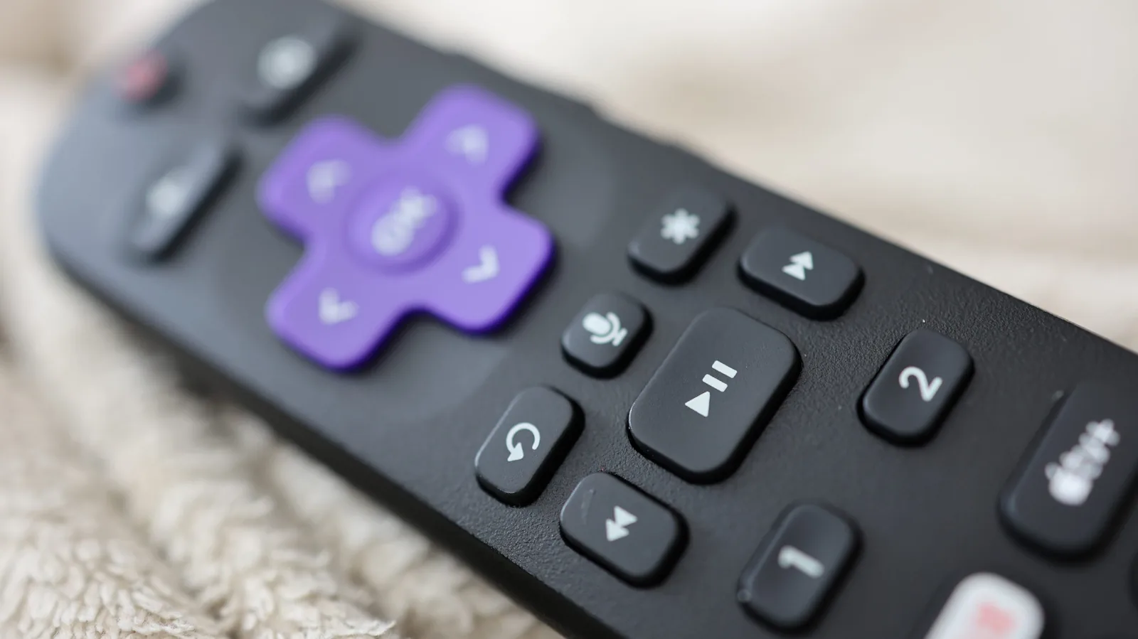 O que é o botão estrela no controle remoto da Roku?